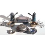 A quantity of silver plate items to include chocolate pots, entrée dish, sauce boats, toast racks,