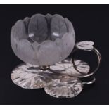 A Christopher Dresser design silver plated and glass bonbon stand of sinuous leaf design with