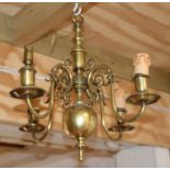 A Hinkley Lighting brass Dutch style four-arm ceiling light, approx 35cms wide.