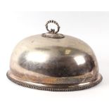 A large Victorian silver plated meat dome with bead decorated rim, 48cms wide.