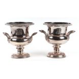 A pair of Victorian Sheffield plate Campana two-handled wine urns, each bearing the family crest for