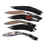 A large Gurkha Kukri knife with a 44.5cms (17.5ins) blade in its leather covered wooden scabbard,