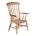 A 19th century beech and elm slat back farmhouse kitchen chair with solid elm seat, on turned legs
