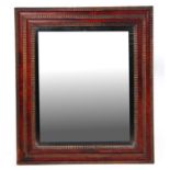 A Dutch tortoiseshell cushion framed wall mirror with bevelled plate, possibly late 17th / early