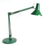 A Herbert Terry style Anglepoise lamp on a circular base.