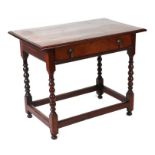 A 19th century 17th century style oak side table with rectangular top above a single frieze