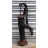 A cast iron water pump, 78cms high.