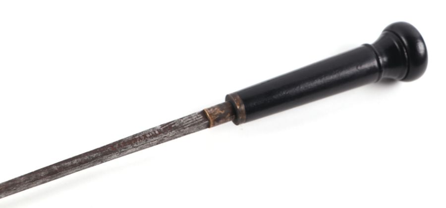 A late 19th century French ebonised sword stick with short stiletto blade, 83cms long. - Image 2 of 2