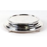 A silver plated stepped circular cake stand, 50cms diameter.