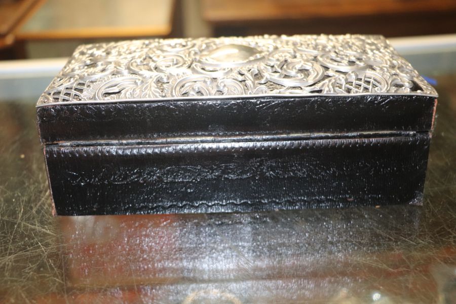 A Victorian leather jewellery box clad with silver repousse decoration, Chester 1896, 21cms wide. - Image 9 of 9