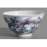 A Chinese porcelain tea bowl decorated with butterflies and insects, six character mark to base, 7.