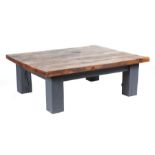 A large modern painted and stained pine coffee table with the rectangular top, on stout square legs,