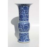 A large Chinese blue and white Gu vase, decorated flowers and foliate scrolls, 47cm high