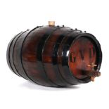 A coopered oak barrel with tap, 44cms high.