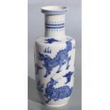 A Chinese blue & white rouleau vase decorated with mythical beasts, 36cms high.Condition