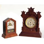 An Edwardian mantle clock, the paper dial with Roman numerals and fitted with an 8-day movement