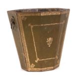 A green leather wastepaper basket of tapering octagonal form with gilt tooled decoration and lion