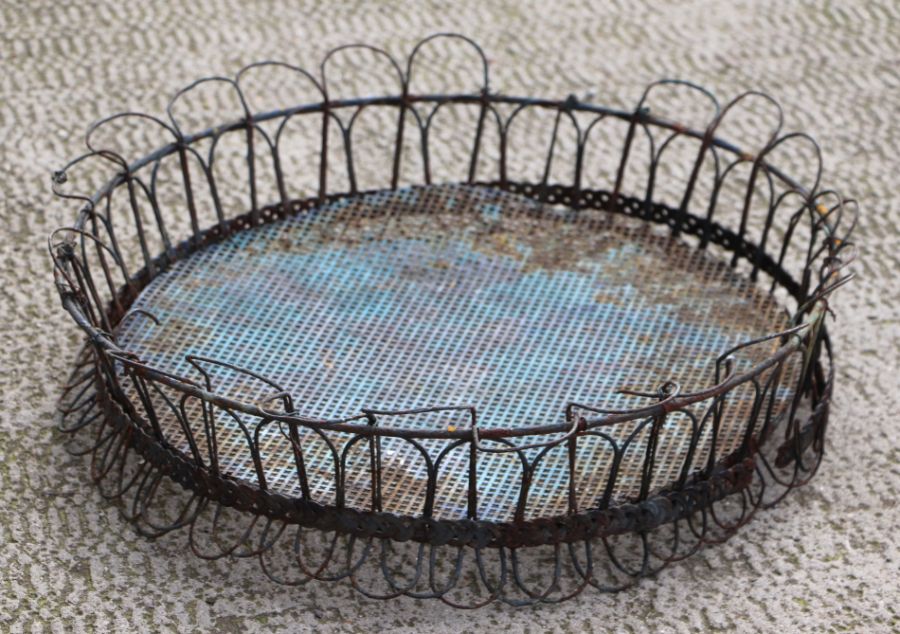 A wire work circular flower basket, 56cms diameter.