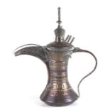 An Islamic / Turkish copper and brass dallah coffee pot, 32cms high.Condition ReportNo holes or