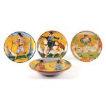 A group of Northern European faience pottery plates decorated with figures; together with a matching