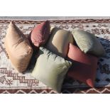 Six silk cushions, the largest approx 58 by 40cms (6).