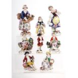 A small collection of continental porcelain figures to include The Flower Seller, 14cms high; a