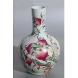 A Chinese famille rose bottle vase decorated with peaches, character mark to base, 38cms high (a/f).