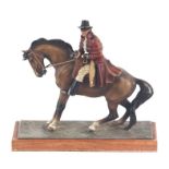 A cold painted spelter table lighter in the form of a highway man, 23cms high.
