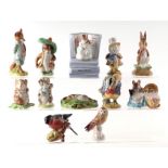 A group of Beswick Beatrix Potter figures to include Benjamin Bunny, Foxy Whiskered Gentleman, Hunca