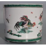 A Chinese famille verte brush pot decorated with chickens, six character mark to base, 12cms