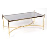 A Maison Jansen style glass and brass coffee table, 108cms wide.