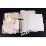 A quantity of assorted linen and lace.