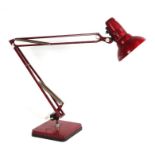 A Herbert Terry style Anglepoise lamp on a square base.