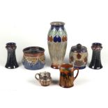 A quantity of Royal Doulton Art Nouveau ceramics to include a small pair of waisted form vases,