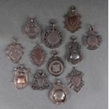 A group of silver pocket watch fobs, various dates and makers marks, 97g.