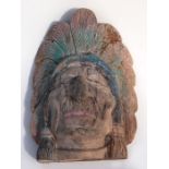 A North American tribal art well weathered carved wooden Native American chief's head with traces of