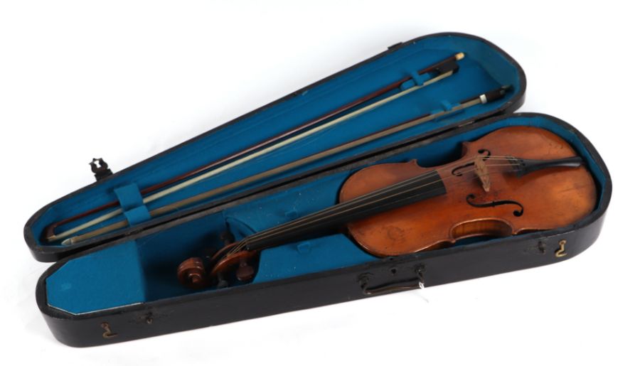 A violin with 14ins two-piece back, bears paper label 'Stradivarius, Made in Germany', with three