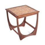 A Modernist teak tile top table, 38cms wide.