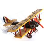 A tinplate bi-plane, 44cms wing span.