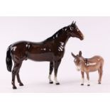 A Beswick quarter stallion and a donkey (2).