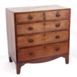 A 19th century mahogany and crossbanded chest with two short and three long drawers, on bracket