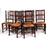 A set of six Victorian Lancastrian ash and elm spindle back rush seat dining chairs (6).