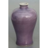 A Chinese Meiping purple glaze monochrome vase, 15cms high.
