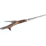 A bamboo shafted sword stick with a 48cms (19ins) square section blade and a stag horn handle.