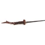 A bamboo shafted sword stick with a 56.5cms (22.25ins) square section blade and a stag horn