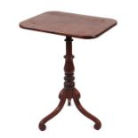 A George III mahogany tilt-top tripod table, the rounded rectangular top on a vase shaped column,