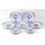 A 19th century Meissen Onion pattern part dinner service comprising nine 24cms diameter plates and