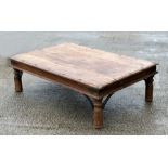 A modern Indonesian hardwood coffee table, 135cms wide.