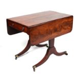 A 19th century flame mahogany sofa table with one faux and one real end drawer, on tapering end