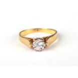 An 18ct gold diamond solitaire ring, approx UK size 'J', 3.5g.